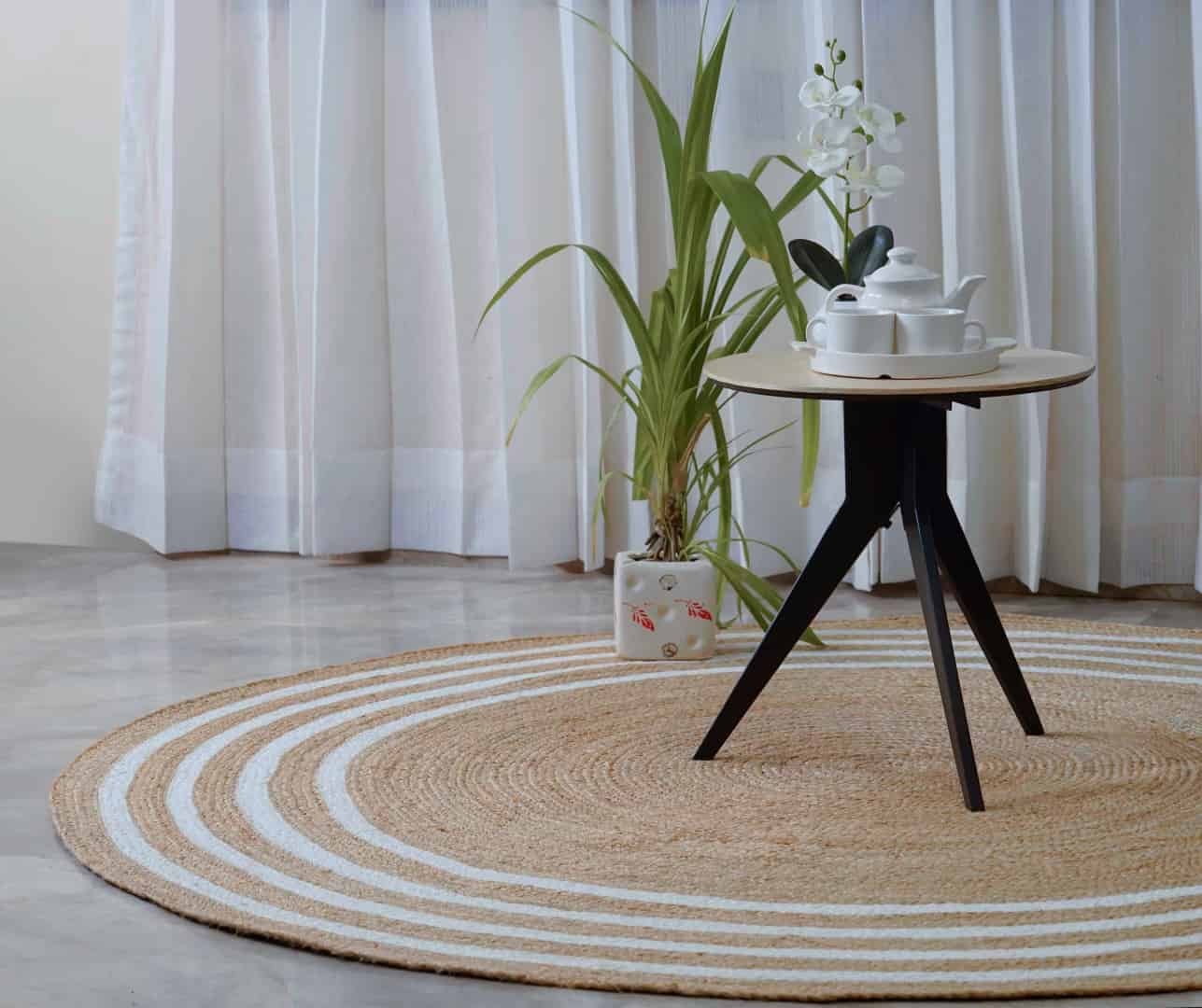 Handmade Round Jute Braided Rug with Chic Border - Image 7