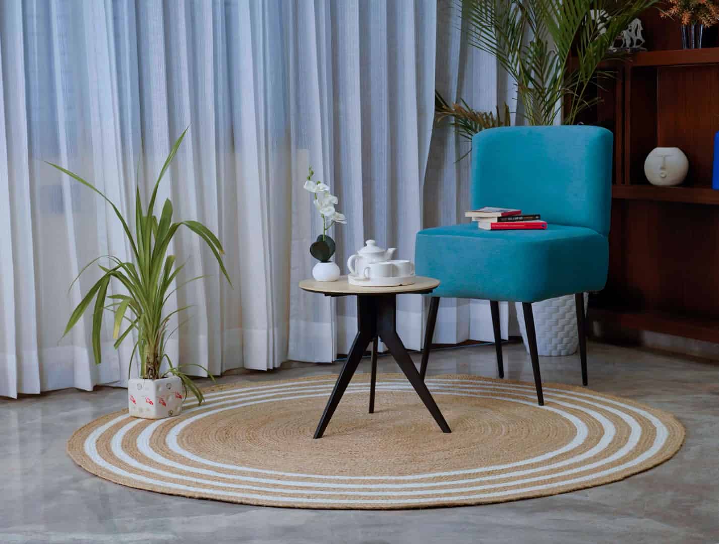 Handmade Round Jute Braided Rug with Chic Border - Image 1